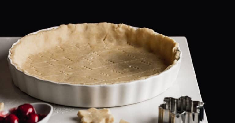 A fresh gluten-free pie shell resting in a pie pan