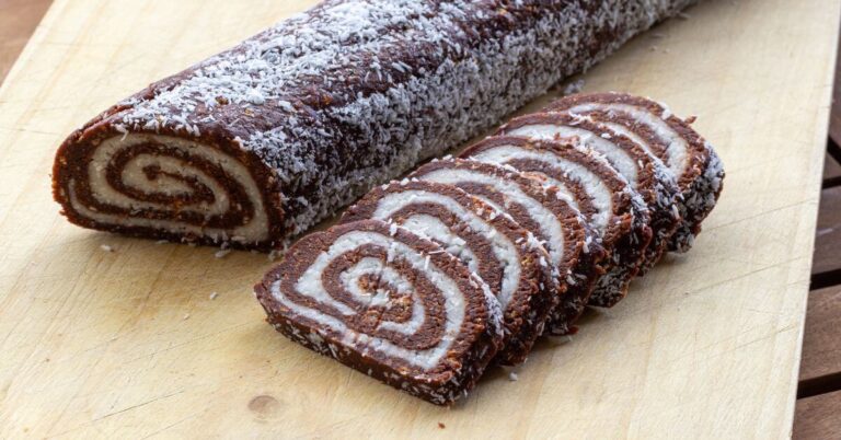 A sliced swiss roll rests on a cutting board, Gluten Free Holiday Dessert Recipes