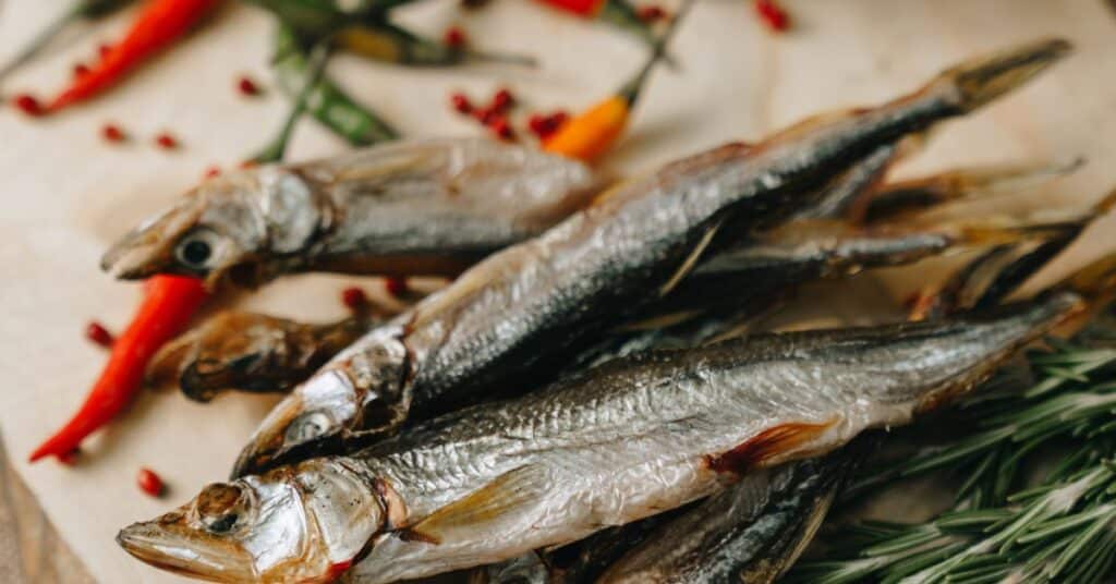 Baked whole sardines on a plate, mediterranean diet benefits