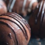 Chocolate-covered truffles sweat in the temperature difference