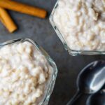 Two glasses of rice pudding with cinnamon sticks, Gluten Free Holiday Dessert Recipes