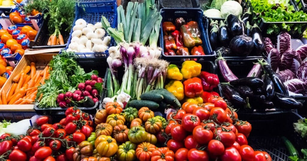 Colorful vegetables in bins at at a market, Natural Ways to Reduce Blood Pressure