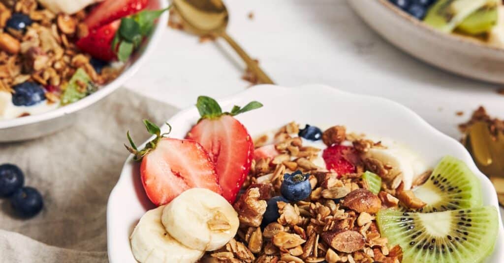 Balanced meal with yogurt, granola, and fruit, Menopause solutions